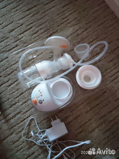 Электрический молокоотсос