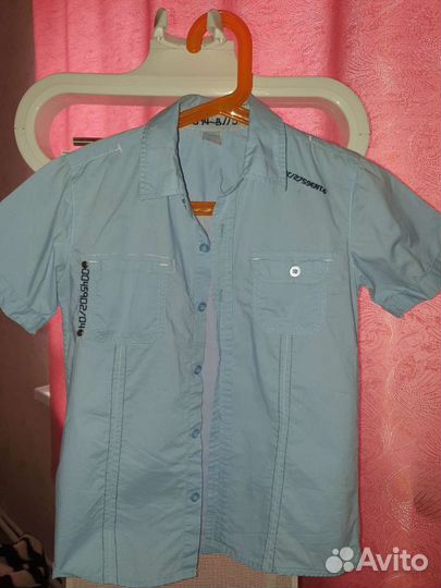 Рубашки разных цветов и размеров