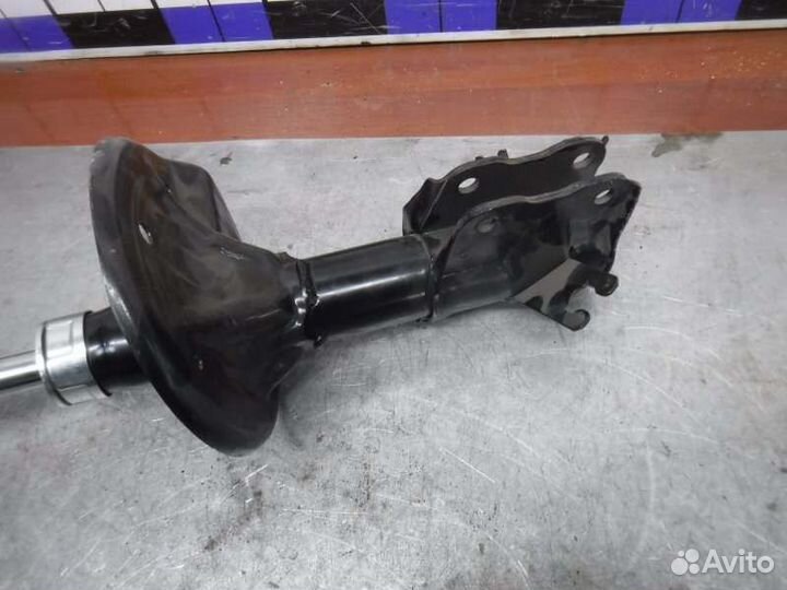 Амортизатор передний левый Mitsubishi Carisma