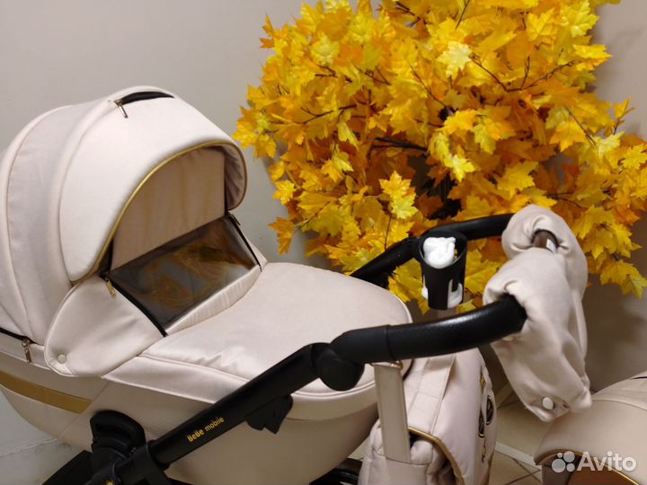 Шикарная бежевая коляска