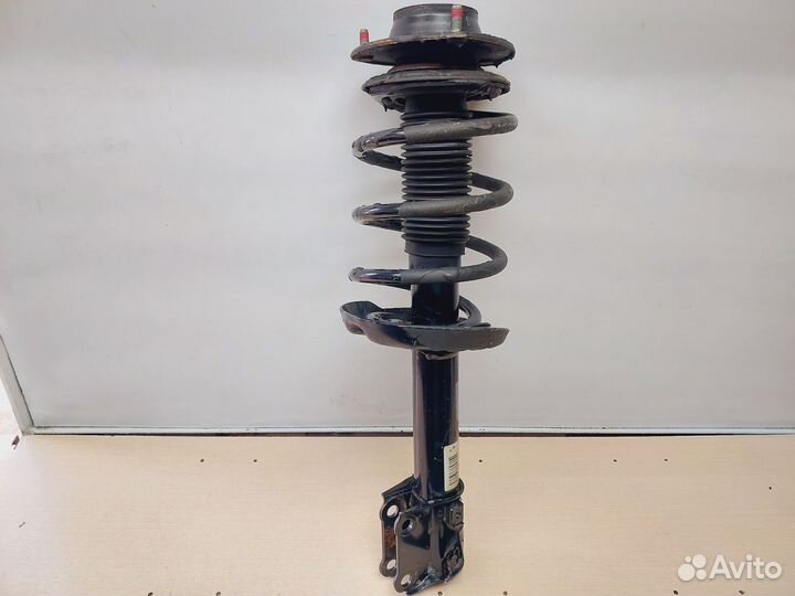 Стойка передняя левая KIA Sportage 2