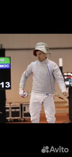 Тренер по фехтованию на саблях