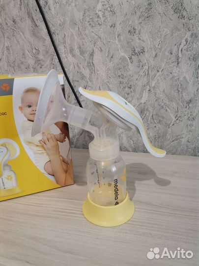 Молокоотсос medela