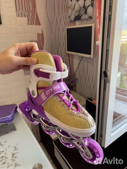 Роликовые коньки