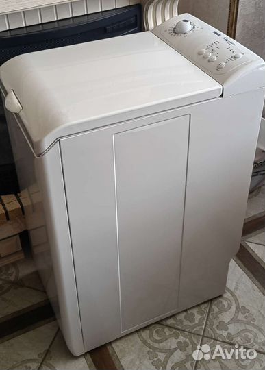 Стиральная машина с вертикальной загрузкой