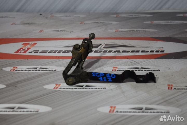 Натяжитель c Toyota Vitz SCP10 1SZ-FE