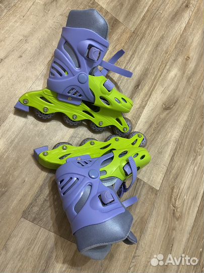 Роликовые коньки