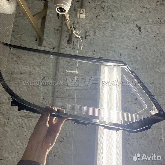 Уцененное стекло для фары Volkswagen Tiguan (2011