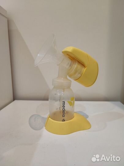 Молокоотсос medela электрический (накладки в подар