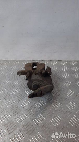 Суппорт тормозной задний левый Audi A6 универсал