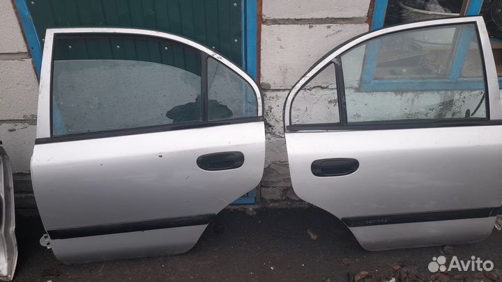 Двери mitsubishi carisma