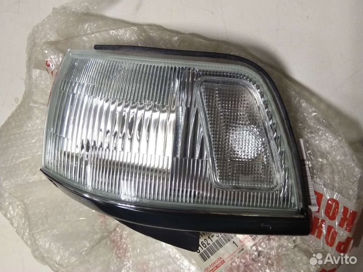 Toyota Camry 86-88 поворотник левый новый оригина