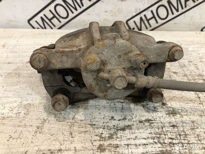 Суппорт тормозной Toyota Corolla E120