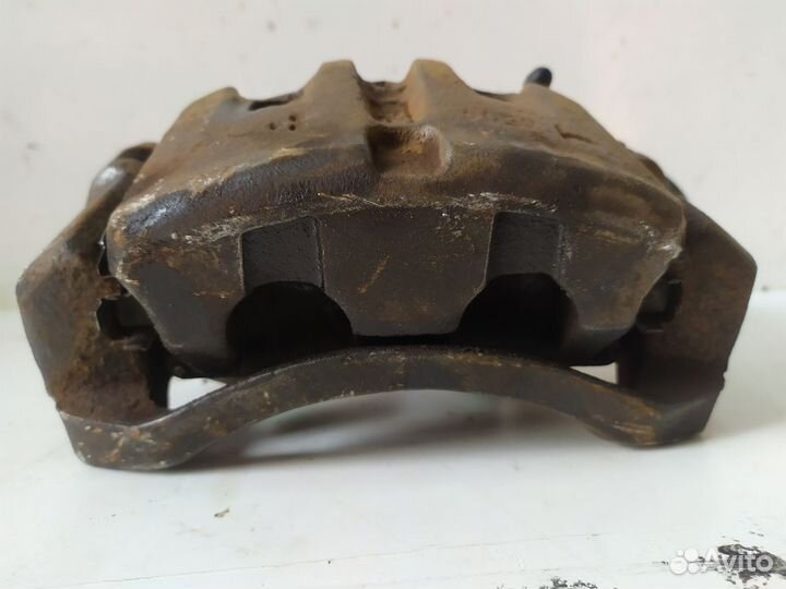 Суппорт тормозной передний левый nissan X-trail