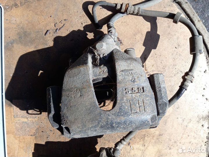 Суппорт передний mazda 3 bk