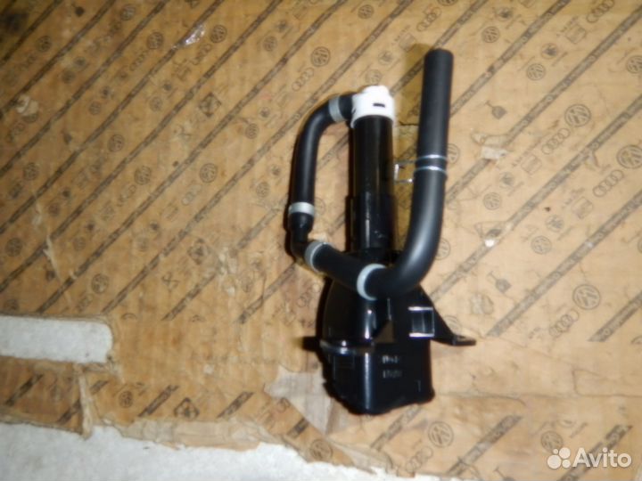 Форсунка омывателя фары левая Outlander XL