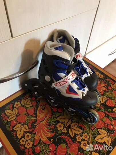 Роликовые коньки новые