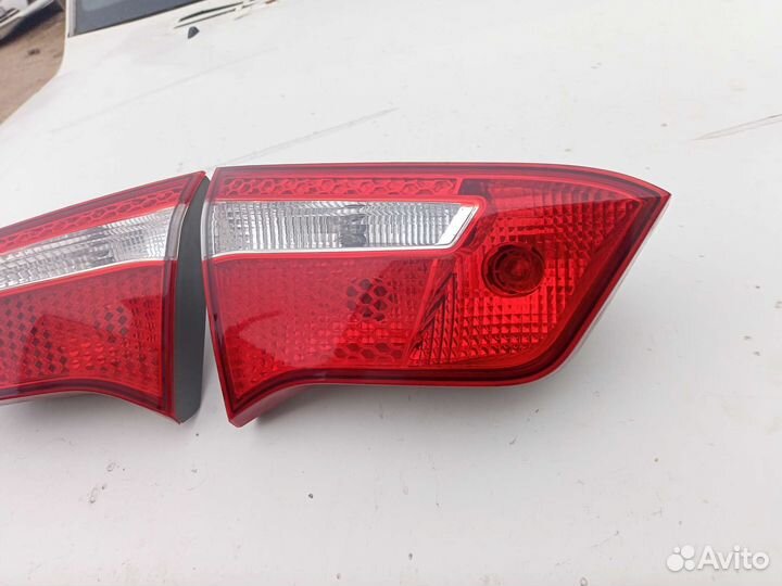 Фонари задней крышки багажника Kia Rio 3