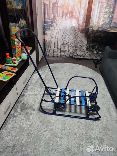 Детские санки на колесах