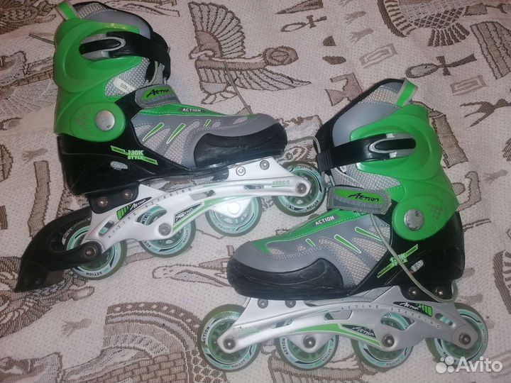 Роликовые коньки