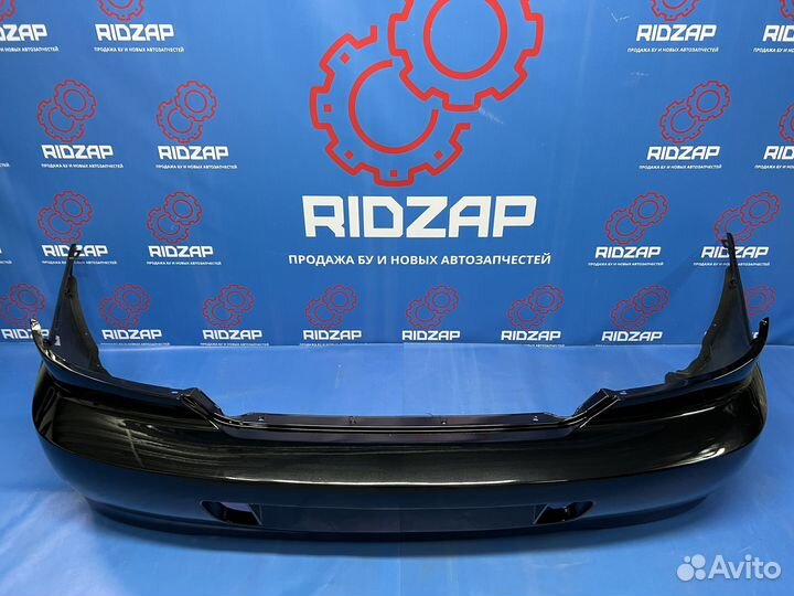 Бампер задний Kia Spectra