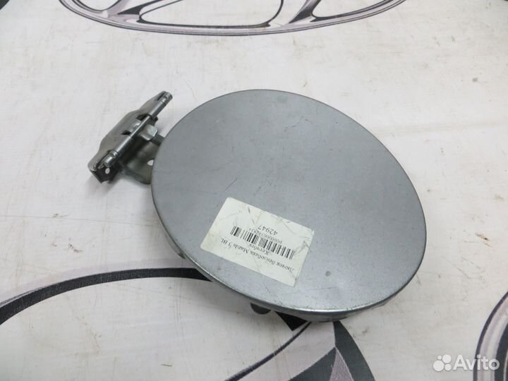 Лючок бензобака Mazda 3 blхетч