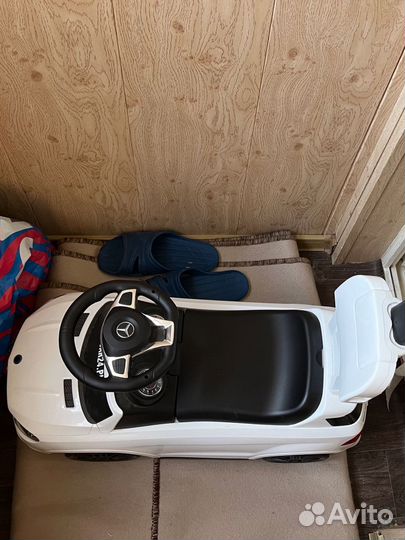 Машинка толкатор каталка