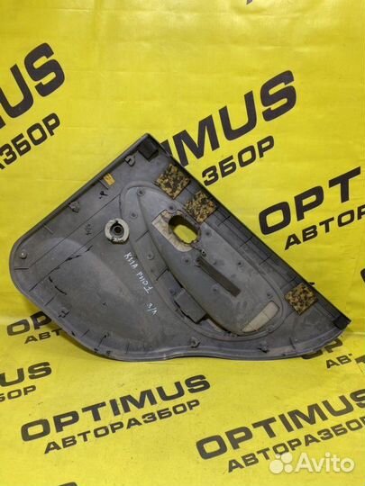 Обшивка двери задняя левая Kia Rio седан A5D 2001