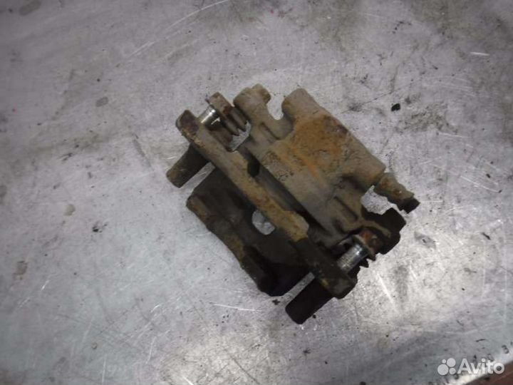 Суппорт задний левый Mitsubishi Lancer 10 4B10