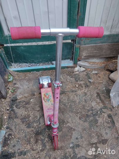 Трёхколёсный самокат