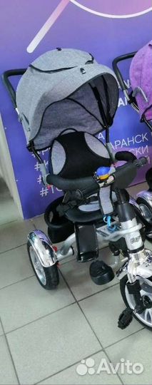 Трехколесный велосипед с ручкой