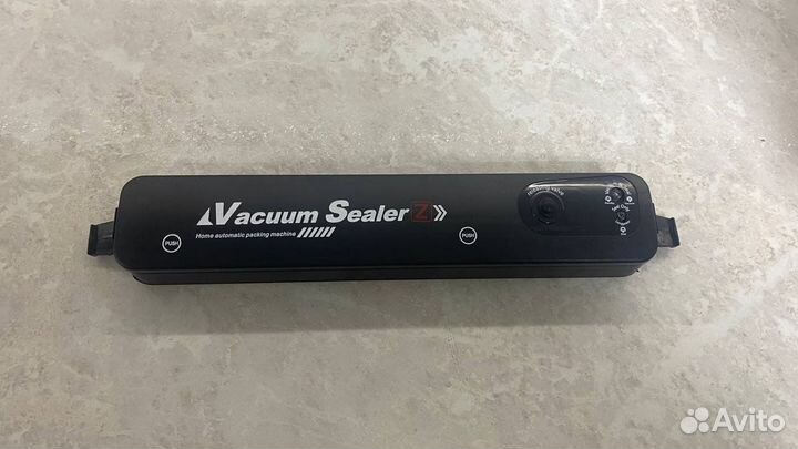 Вакуумный упаковщик