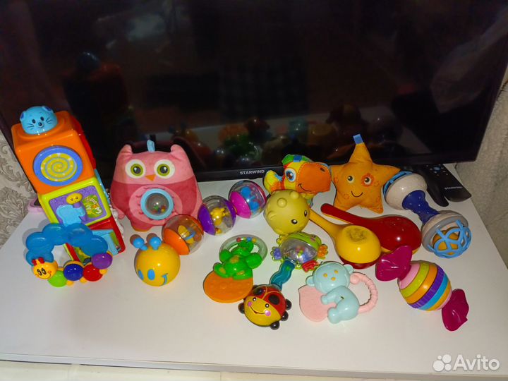 Погремушки - развивающие игрушки для малышей