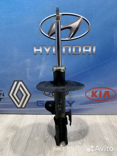 Амортизатор стойка перед Geely emgrand X7 Лев