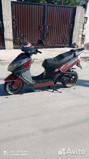 Скутер мопед