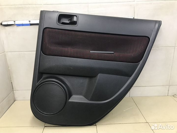 Обшивка двери задней правой M2 (2010-1014)
