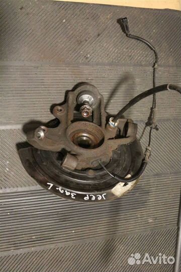 Кулак поворотный задний левый Jeep Grand Cherokee