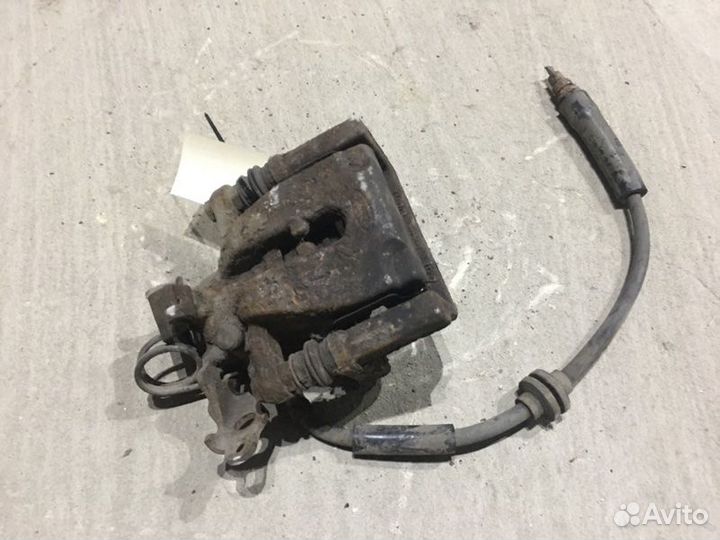 Суппорт тормозной задний левый Ford Kuga 1 2.5 I