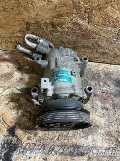 Компрессор кондиционера Рено Логан Сандеро