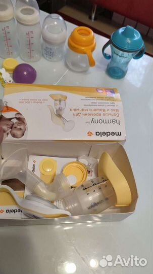 Молокоотсос medela, бутылочки, поильники