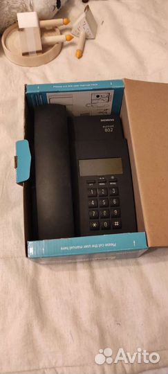 Проводной телефон