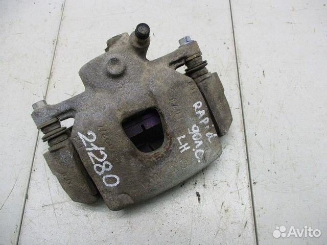 Суппорт передний левый Skoda Rapid