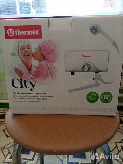 Электрический проточный водонагреватель thermex