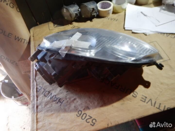 Фара левая Volkswagen Golf V / Jetta V