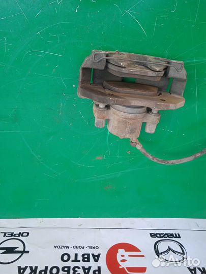 Суппорт тормозной передний Ford Focus 2