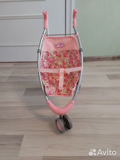 Детская игрушечная коляска