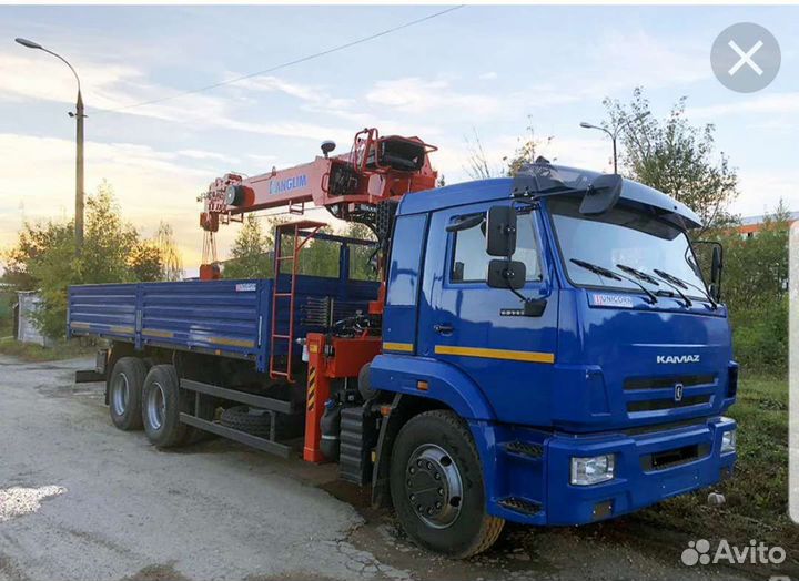 Водитель на Камаз-манипулятор