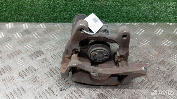 Суппорт Volkswagen Tiguan Левый Задний