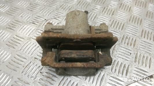 Суппорт тормозной задний левый toyota avensis T25