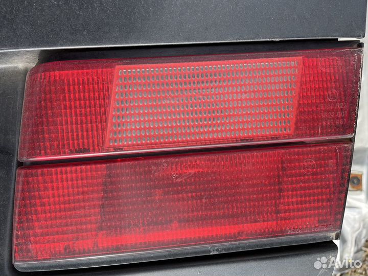 Фонарь левый на крышку багажника BMW E34